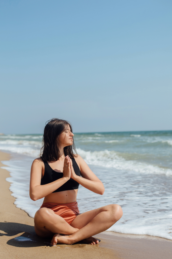 mental health entrepreneur meditation at the beach